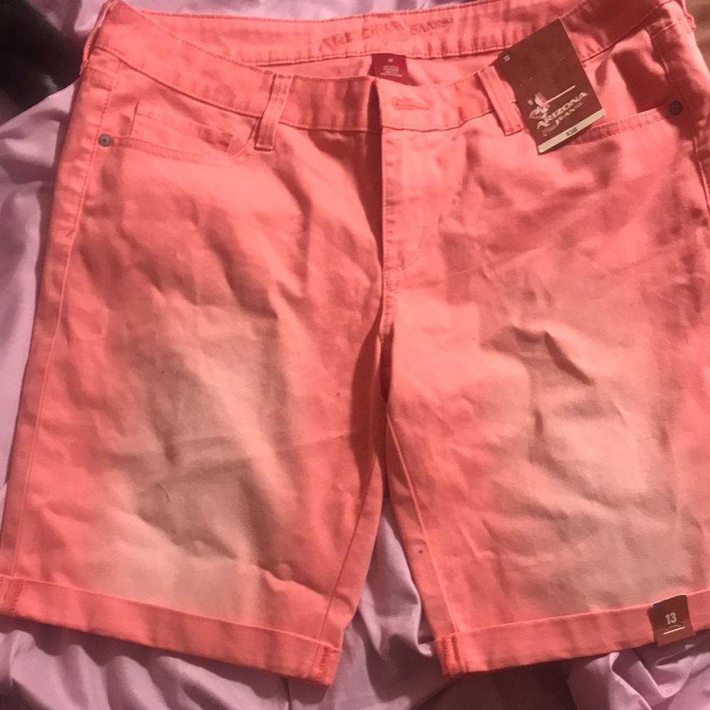 knee length pink faded shorts